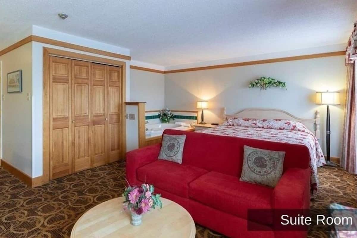 suite, 1 king bed with sofa bed | premium bedding, select comfort beds, desk, blackout curtains