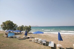 On the beach, sun-loungers, beach umbrellas, beach towels - Irina Beach Hotel (Kos)