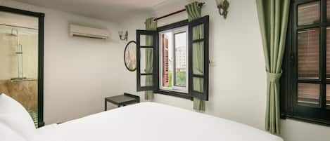 Premium bedding, memory-foam beds, minibar, in-room safe