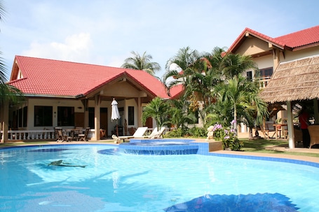 Outdoor pool, pool umbrellas, sun loungers