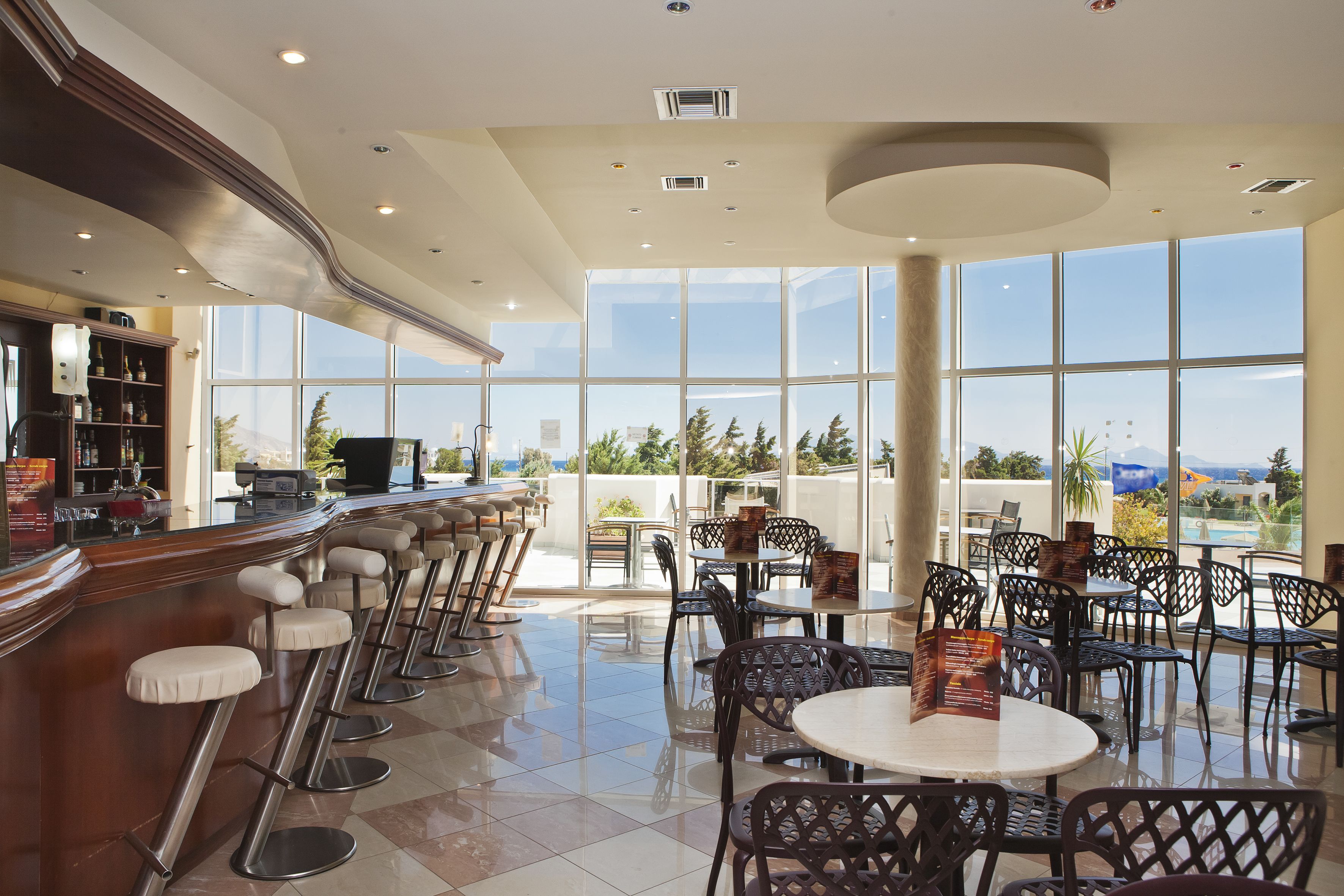 3 bars/lounges, poolside bar, beach bar