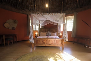 Banda Bungalo | Down comforters, memory foam beds, in-room safe, blackout drapes