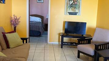 Superior Apartment, 2 Bedrooms | Living area | Flat-screen TV