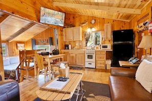 1 - Fishermans Cabin | Living area | Flat-screen TV
