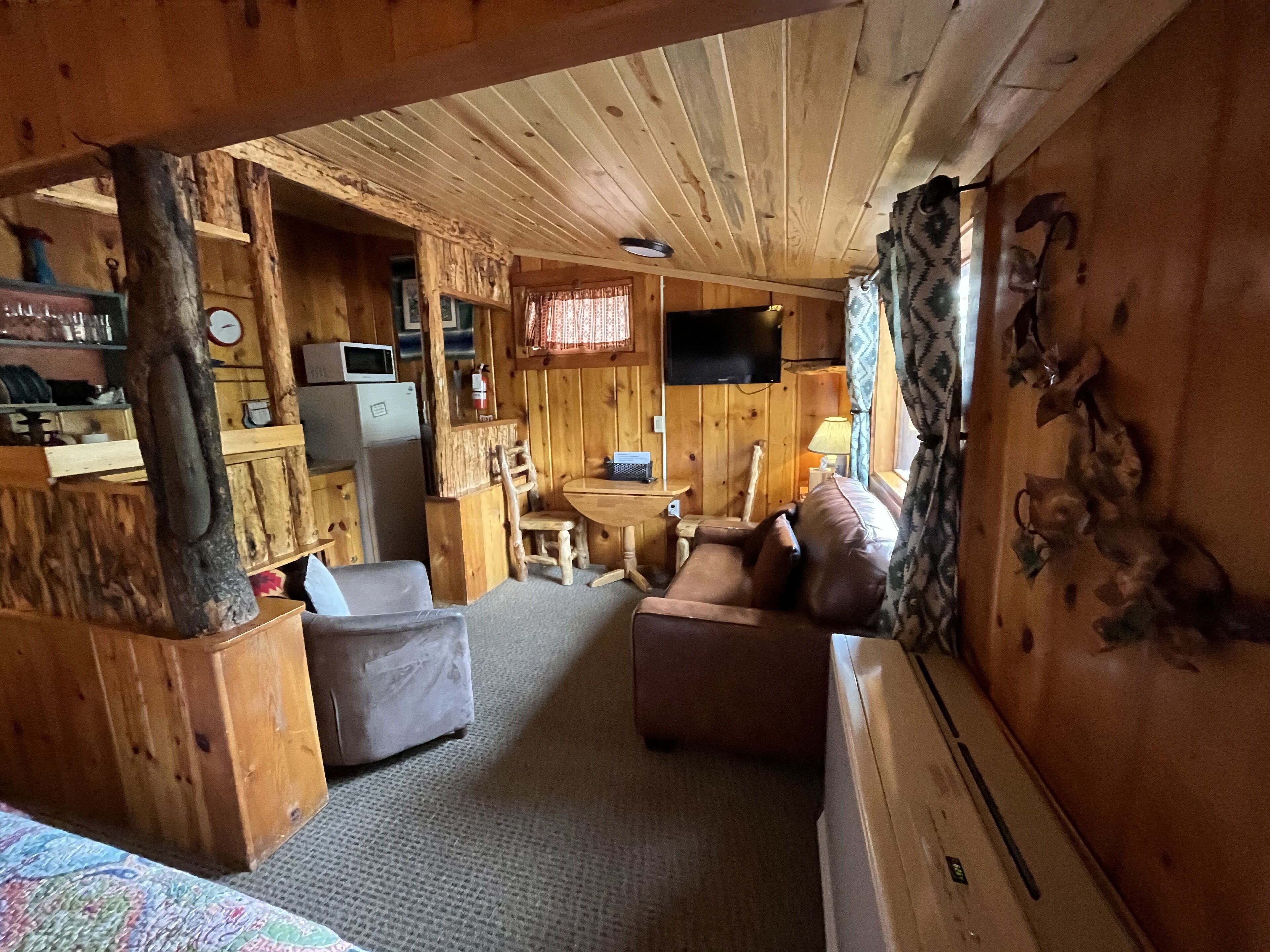 4 - honeymoon cabin (duplex) | living area | flat-screen tv