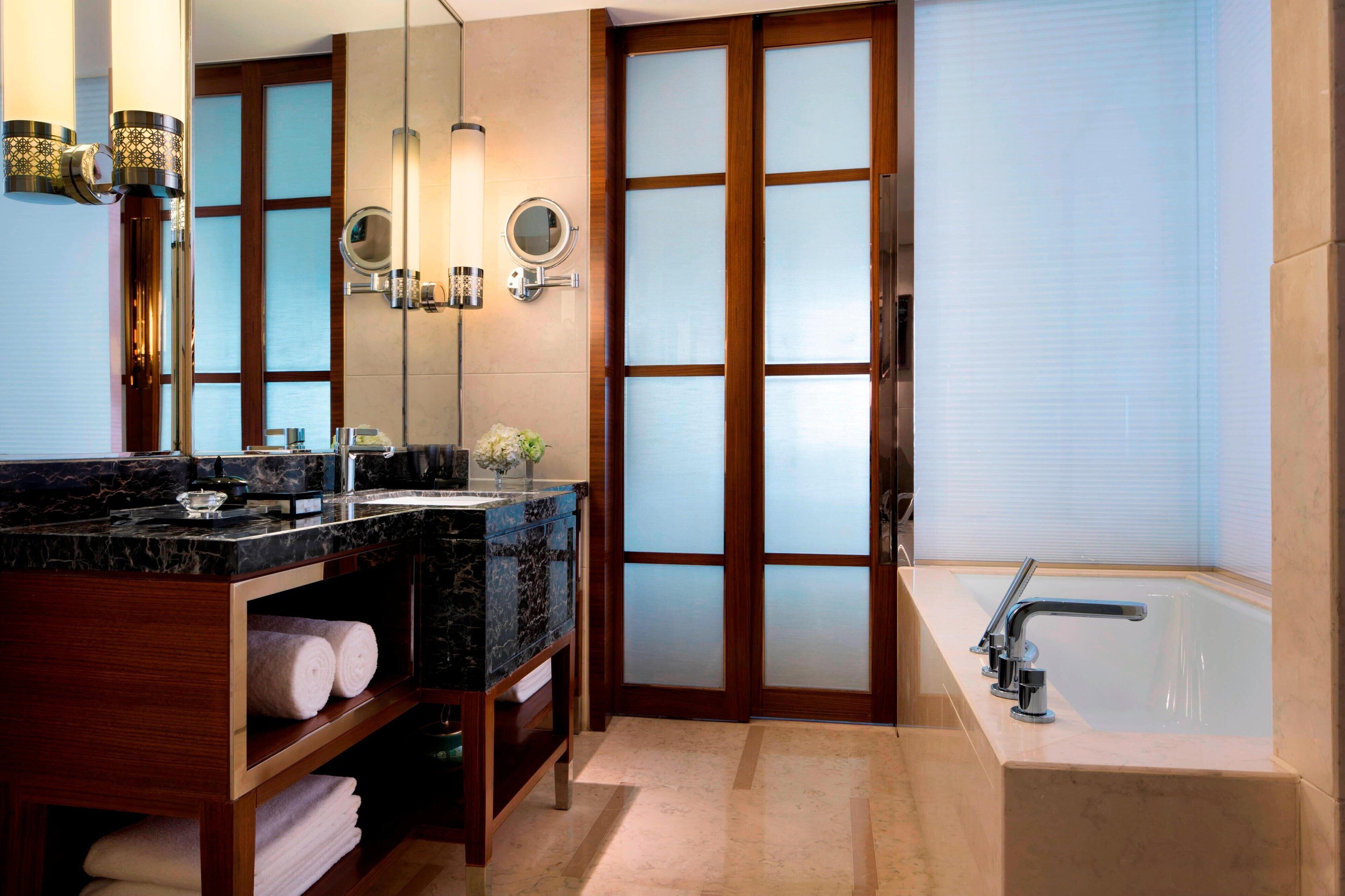 separate bathtub and shower, free toiletries, hair dryer, bathrobes