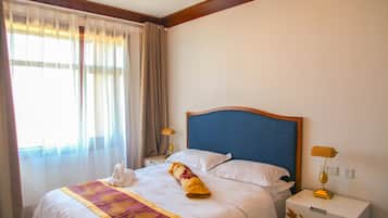 Premium bedding, pillowtop beds, minibar, in-room safe