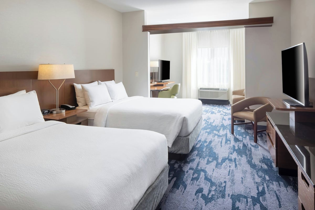 Desk, blackout curtains, iron/ironing board, free rollaway beds