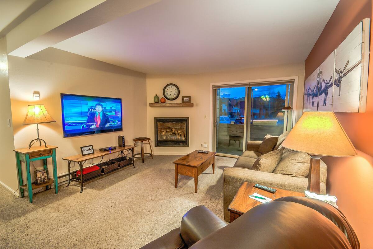 2 Bedroom, 2 Bathroom - C 109 | Living area | Flat-screen TV, fireplace