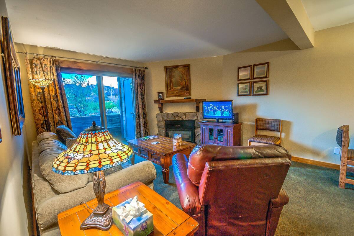 1 Bedroom, 1 Bathroom - A 104 | Living area | Flat-screen TV, fireplace