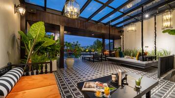 Outdoor pool, open 6:00 AM to 9:00 PM, pool loungers