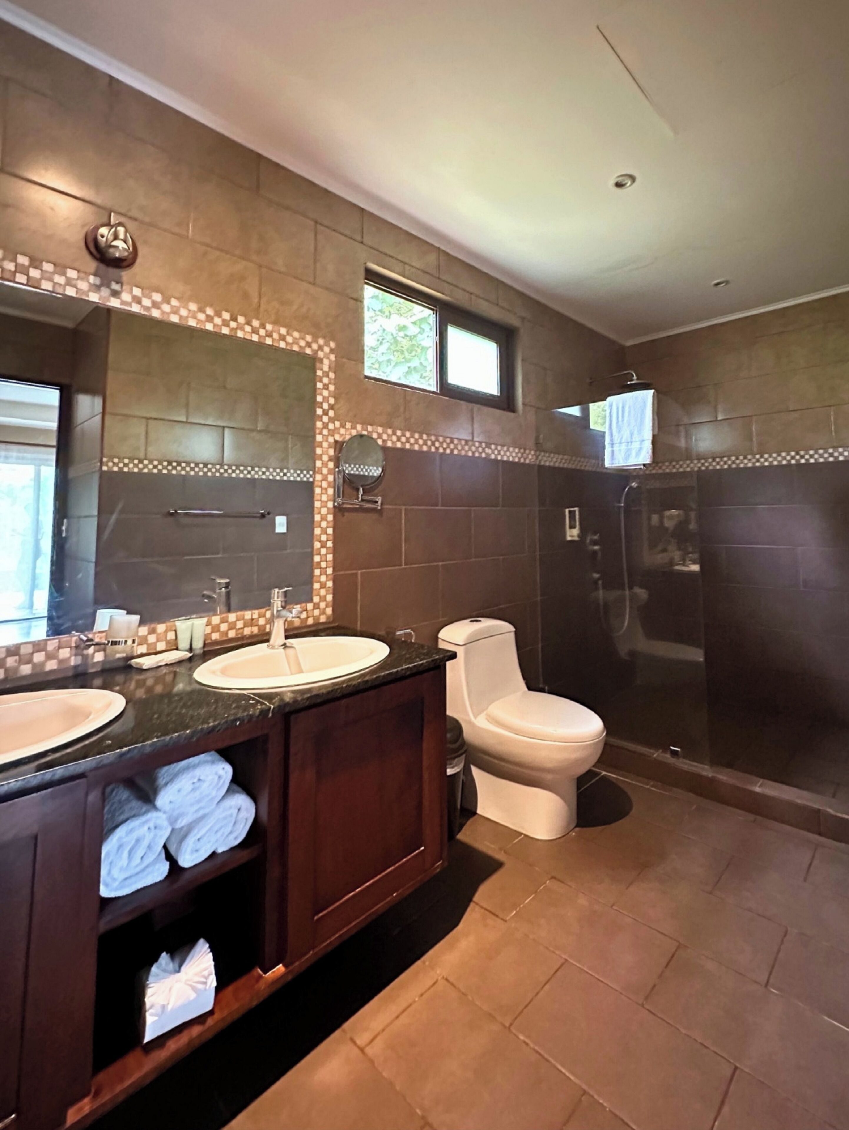superior family room | bathroom | separate bathtub and shower, jetted bath, rainfall showerhead