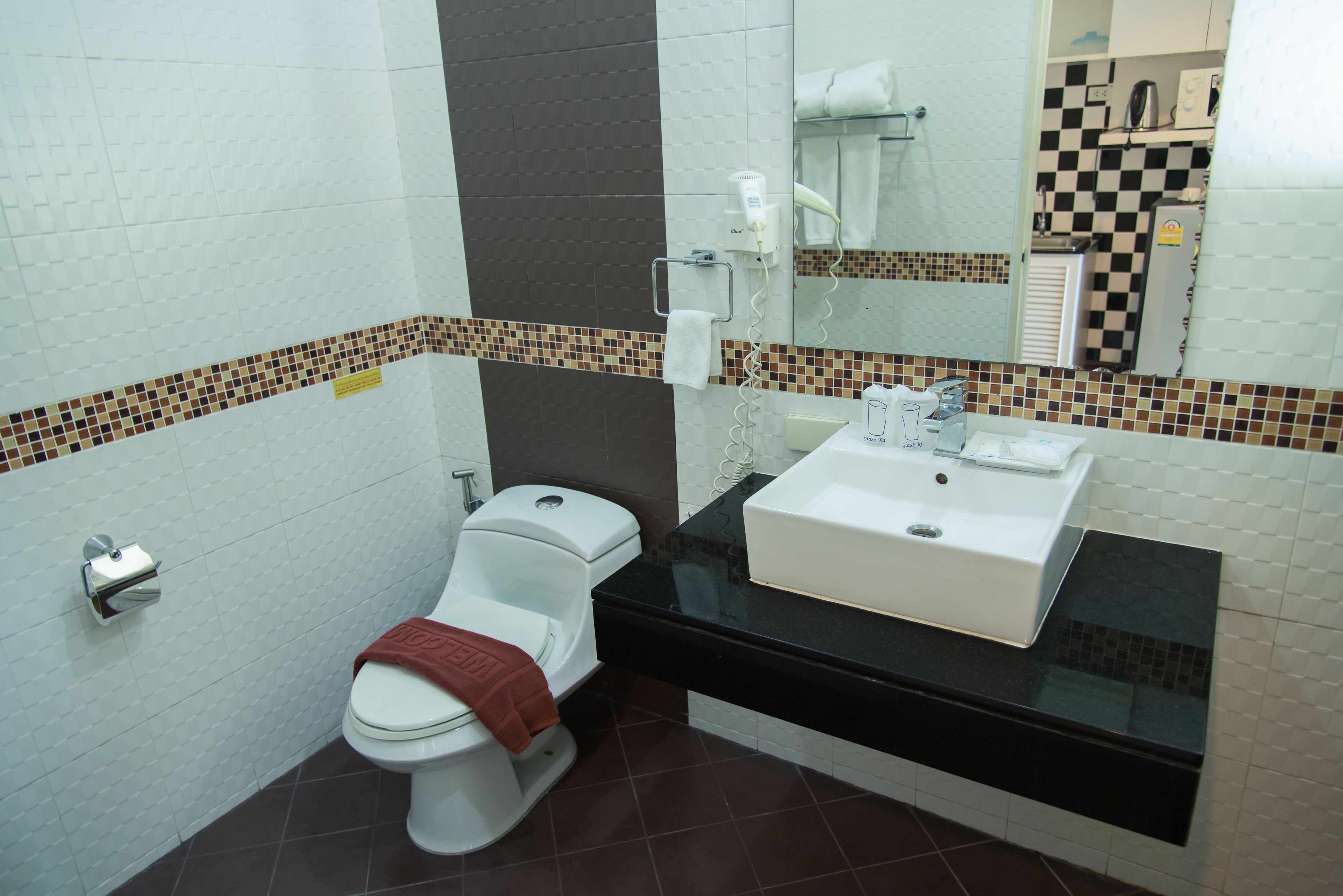 superior room | bathroom | shower, hair dryer, towels