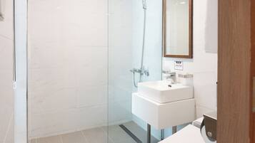 Shower, free toiletries, hair dryer, slippers