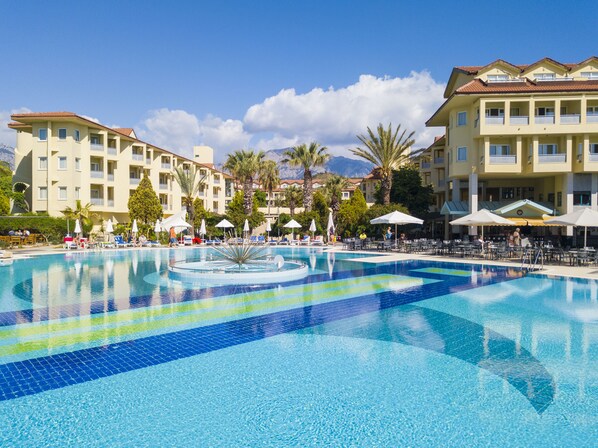 Indoor pool, 2 outdoor pools, open 8:00 AM to 7:00 PM, pool umbrellas
