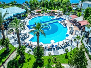 Indoor pool, 2 outdoor pools, open 8:00 AM to 7:00 PM, pool umbrellas
