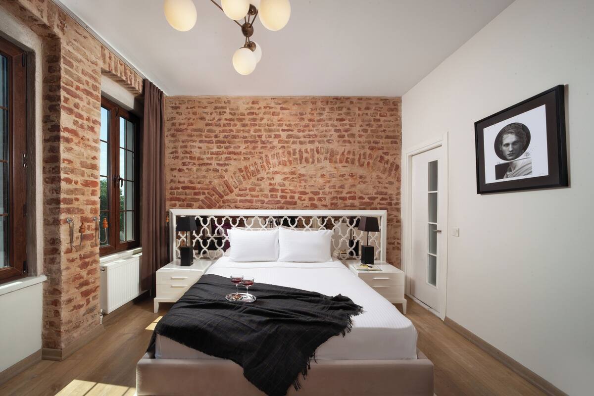 Chambre Double Deluxe, vue ville | Draps en coton égyptien, literie de qualité supérieure, minibar