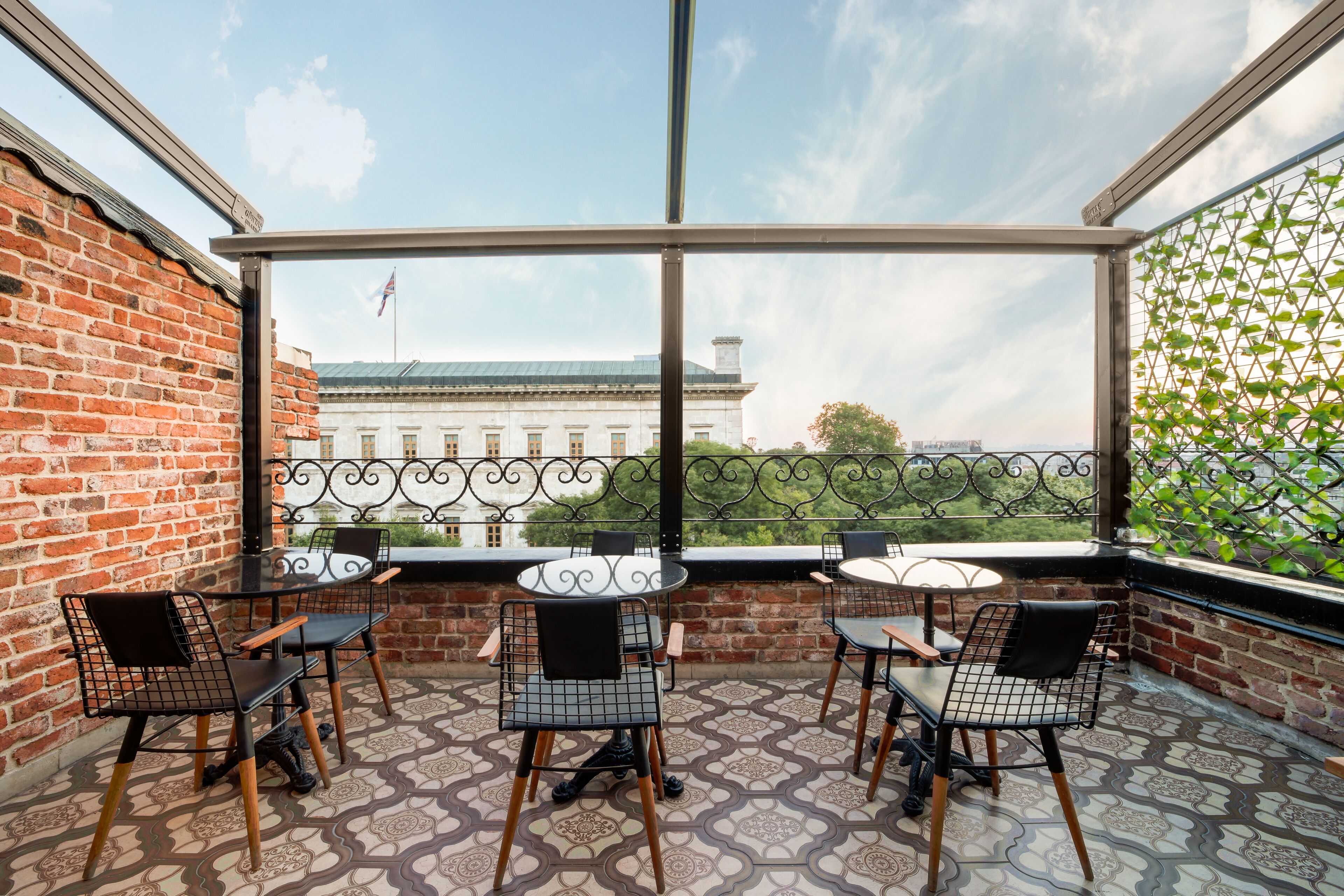 deluxe double room with brick wall | terrace/patio