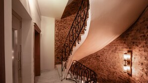A staircase with a brick wall and a metal railing. - Nine Istanbul Hotel (Istanbul)