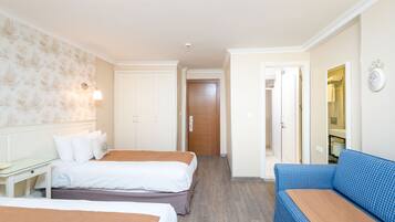 Economy Double or Twin Room | Minibar, in-room safe, free WiFi, bed sheets