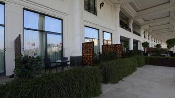 Family Suite, Multiple Beds, Garden Area | Terrace/patio