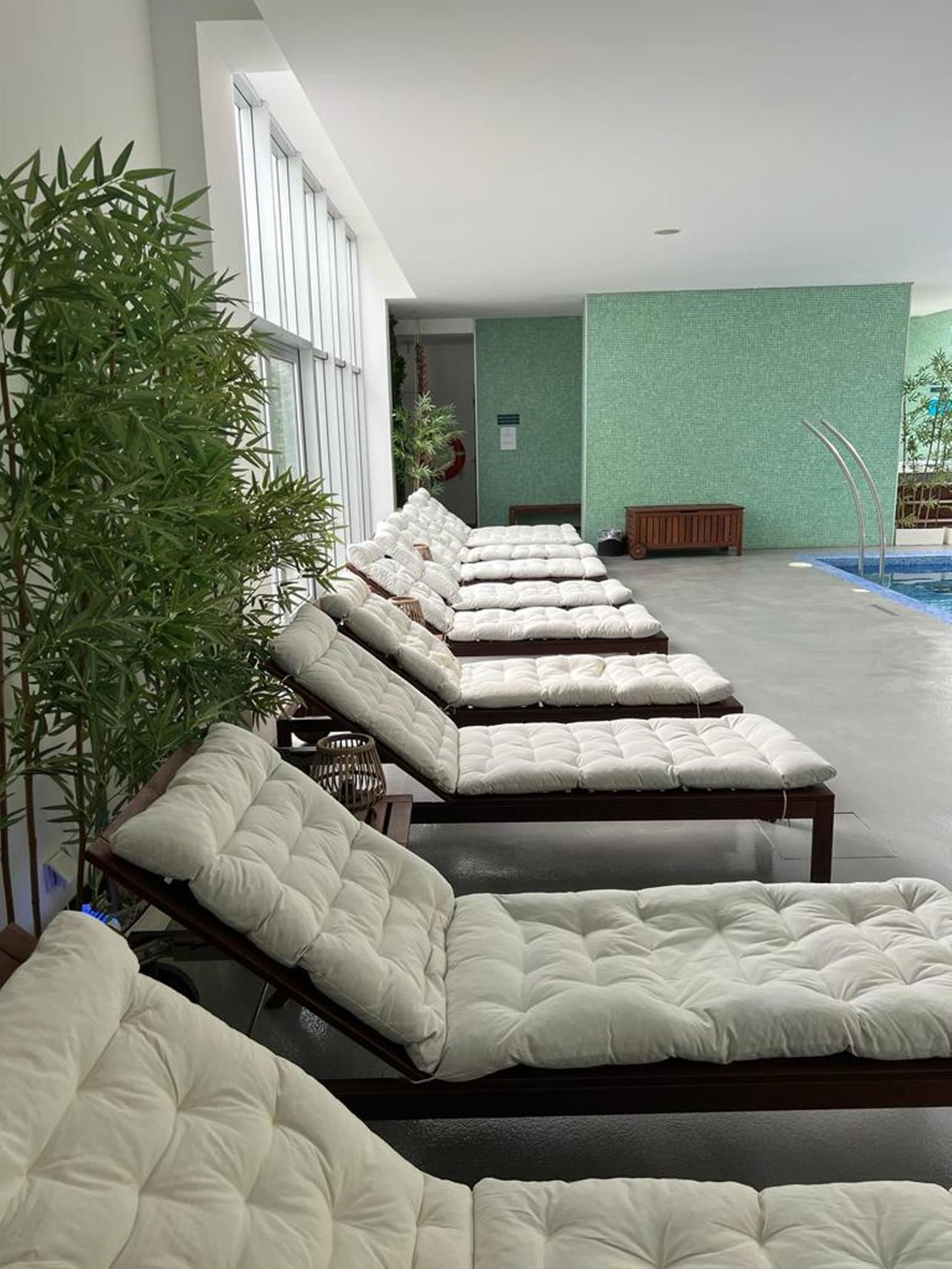 indoor pool, seasonal outdoor pool, pool loungers