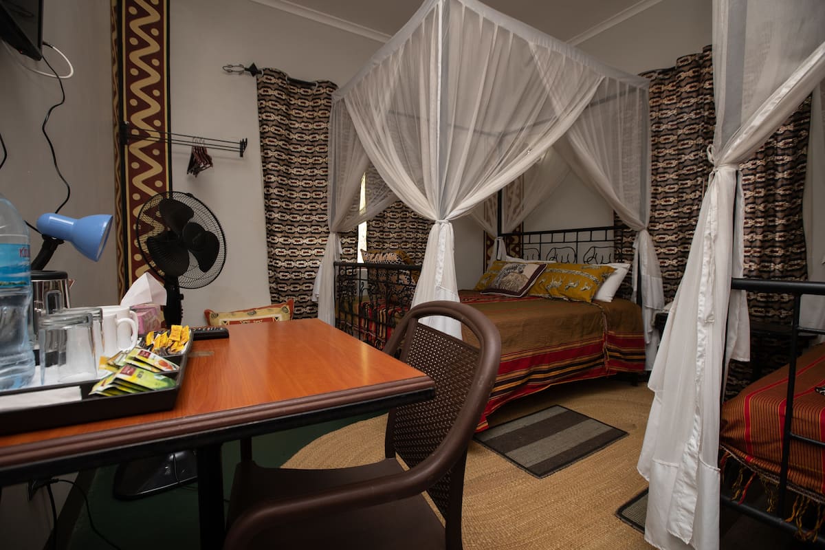 Premium bedding, pillow-top beds, minibar, in-room safe