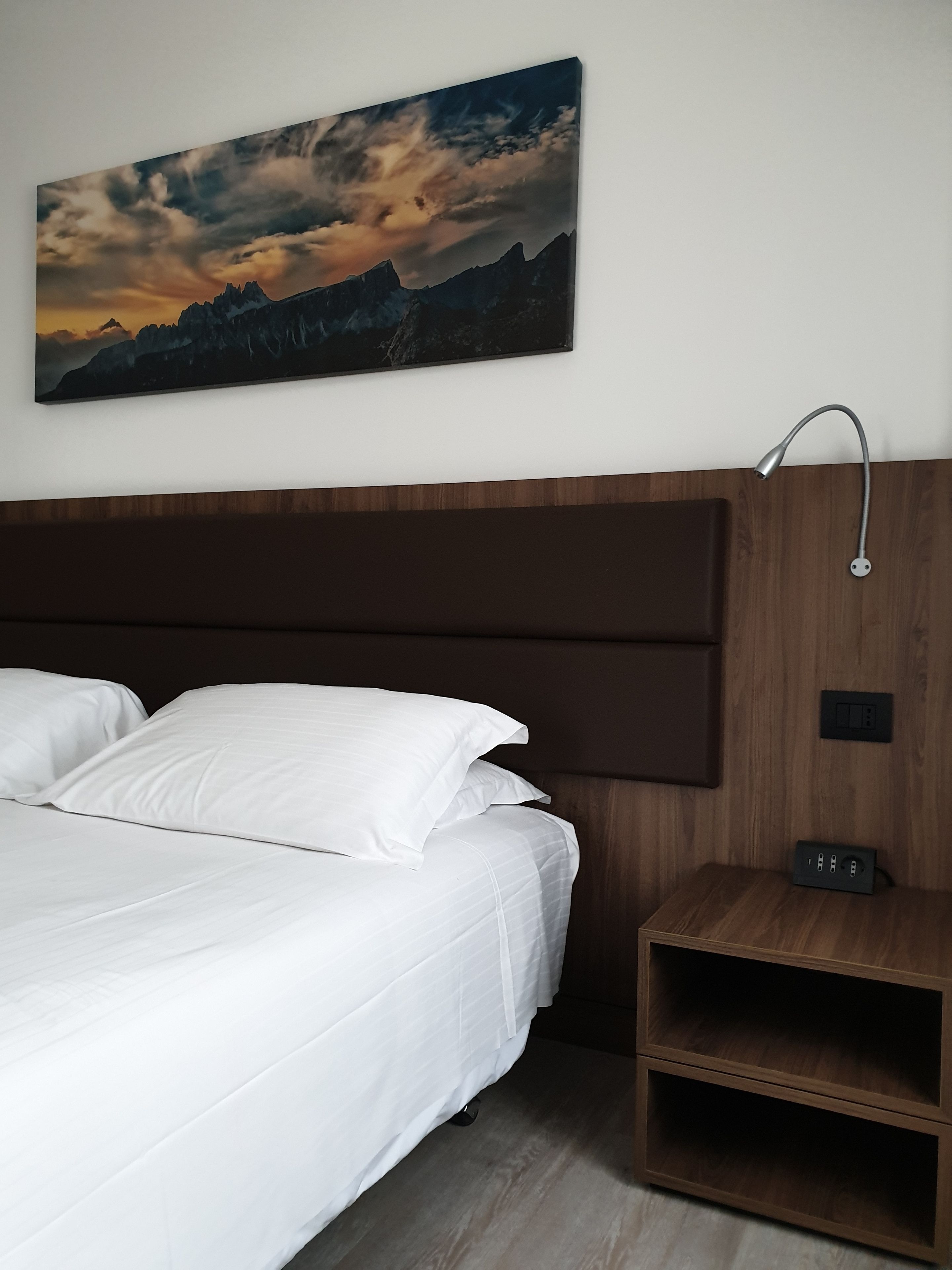 junior suite | in-room safe, desk, blackout curtains, iron/ironing board