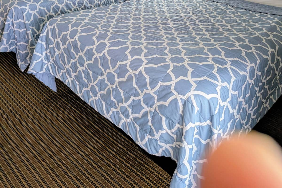 Large Balcony Side Ocean View with 2 Queen beds | Iron/ironing board, free WiFi, bed sheets