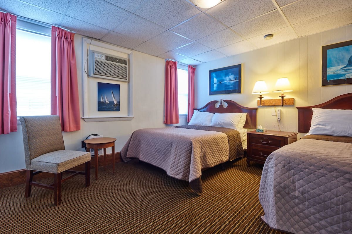 Standard Room, 2 Queen Beds | Iron/ironing board, free WiFi, bed sheets