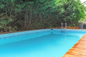 Seasonal outdoor pool, pool umbrellas, sun loungers