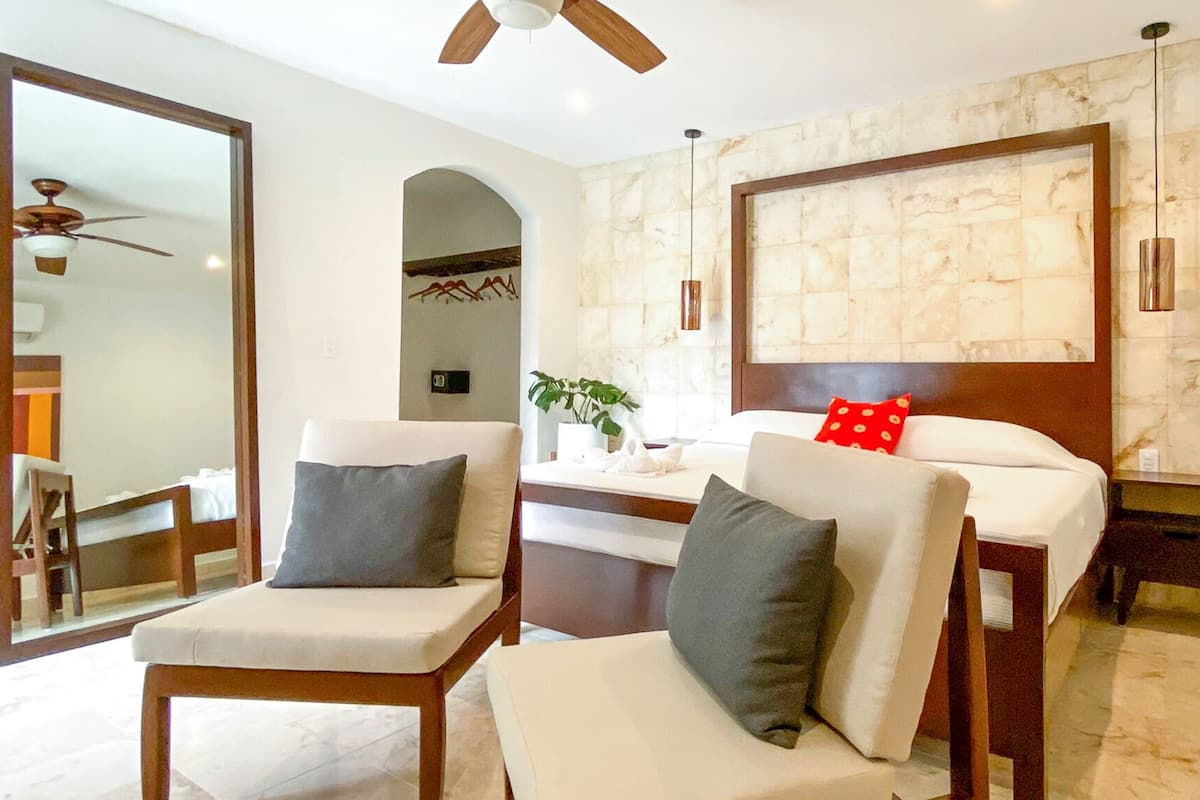 Junior Studio Suite, 1 Bedroom, Non Smoking, Pool View | Premium bedding, in-room safe, desk, iron/ironing board