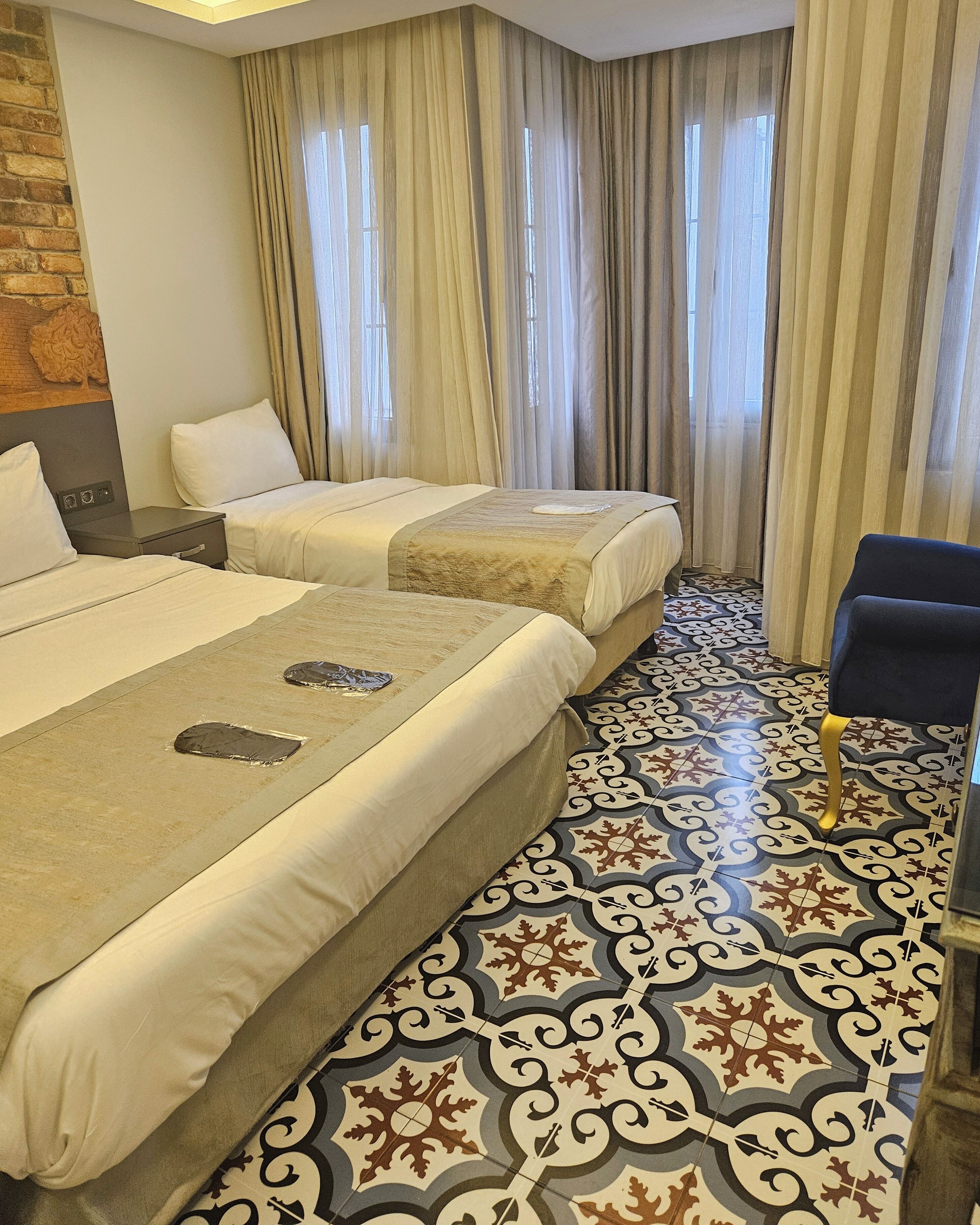 Chambre Triple Supérieure | Minibar, coffres-forts dans les chambres, chambres insonorisées