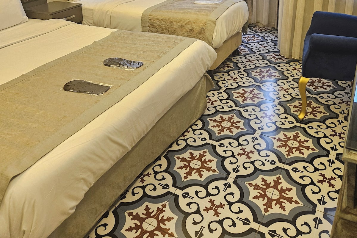 Chambre Triple Supérieure | Minibar, coffres-forts dans les chambres, chambres insonorisées