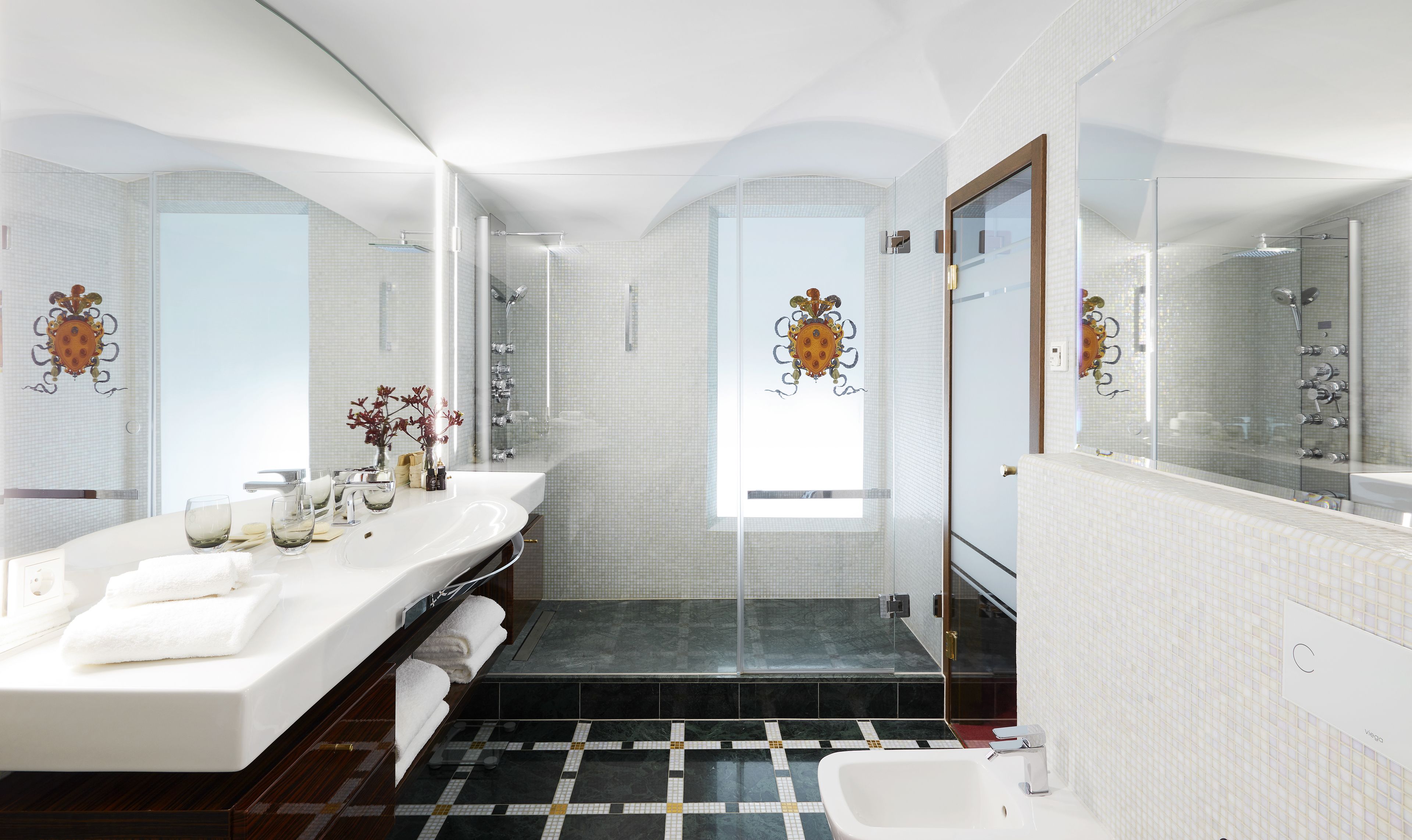 designer toiletries, hair dryer, bathrobes, slippers