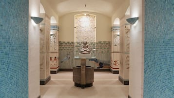 Explore ancient history in this corridor, lined with hieroglyphic inscriptions and arches.