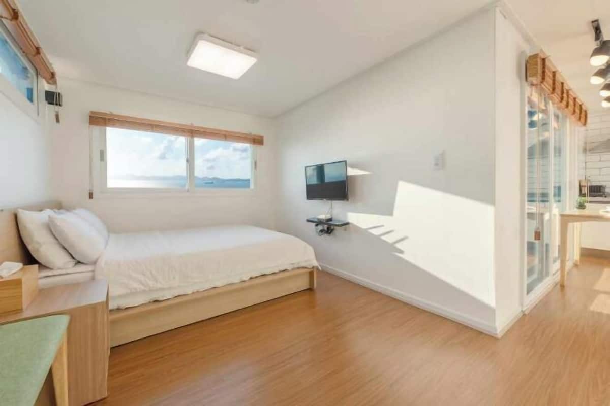 Premium bedding, blackout drapes, soundproofing, free WiFi