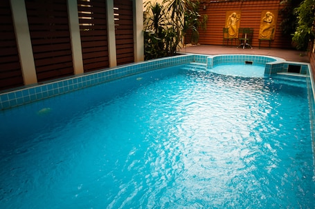 Outdoor pool, sun loungers