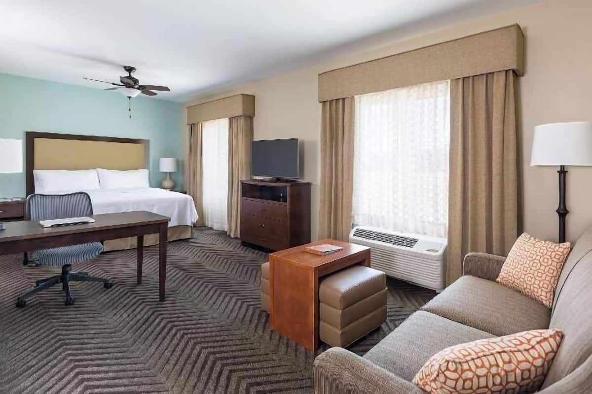 Down comforters, desk, blackout drapes, iron/ironing board