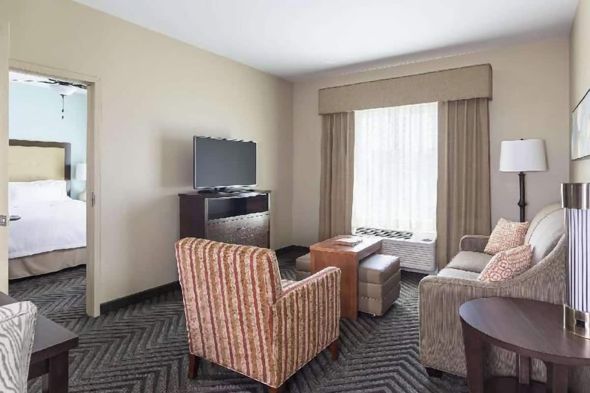 Down comforters, desk, blackout drapes, iron/ironing board