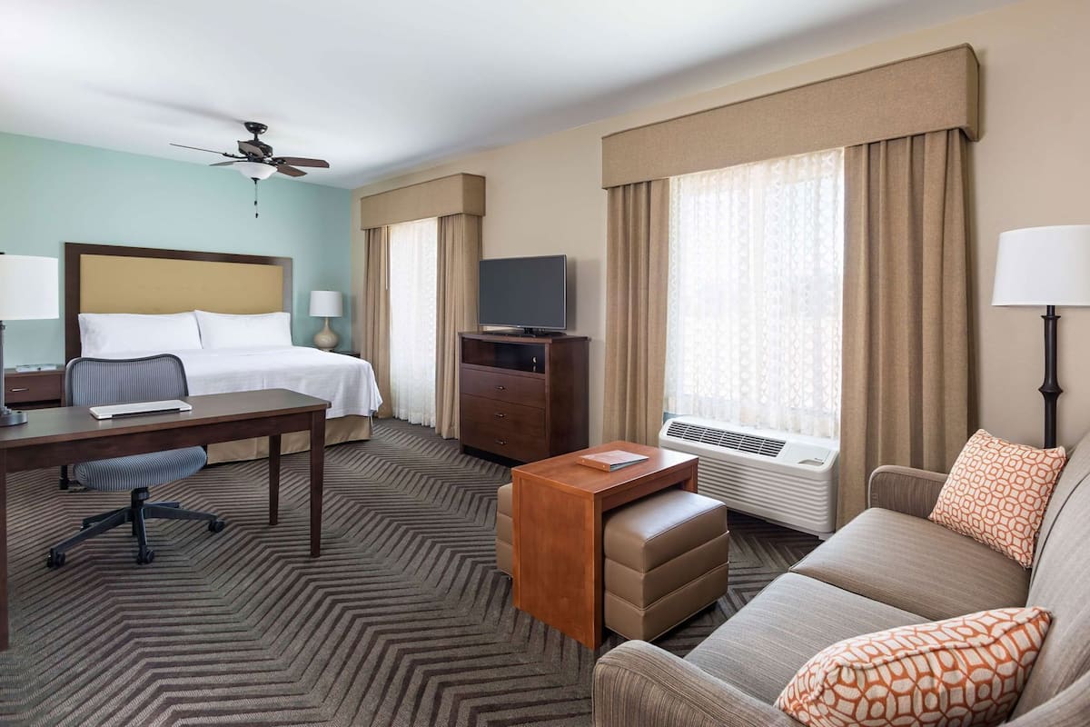 Down comforters, desk, blackout drapes, iron/ironing board