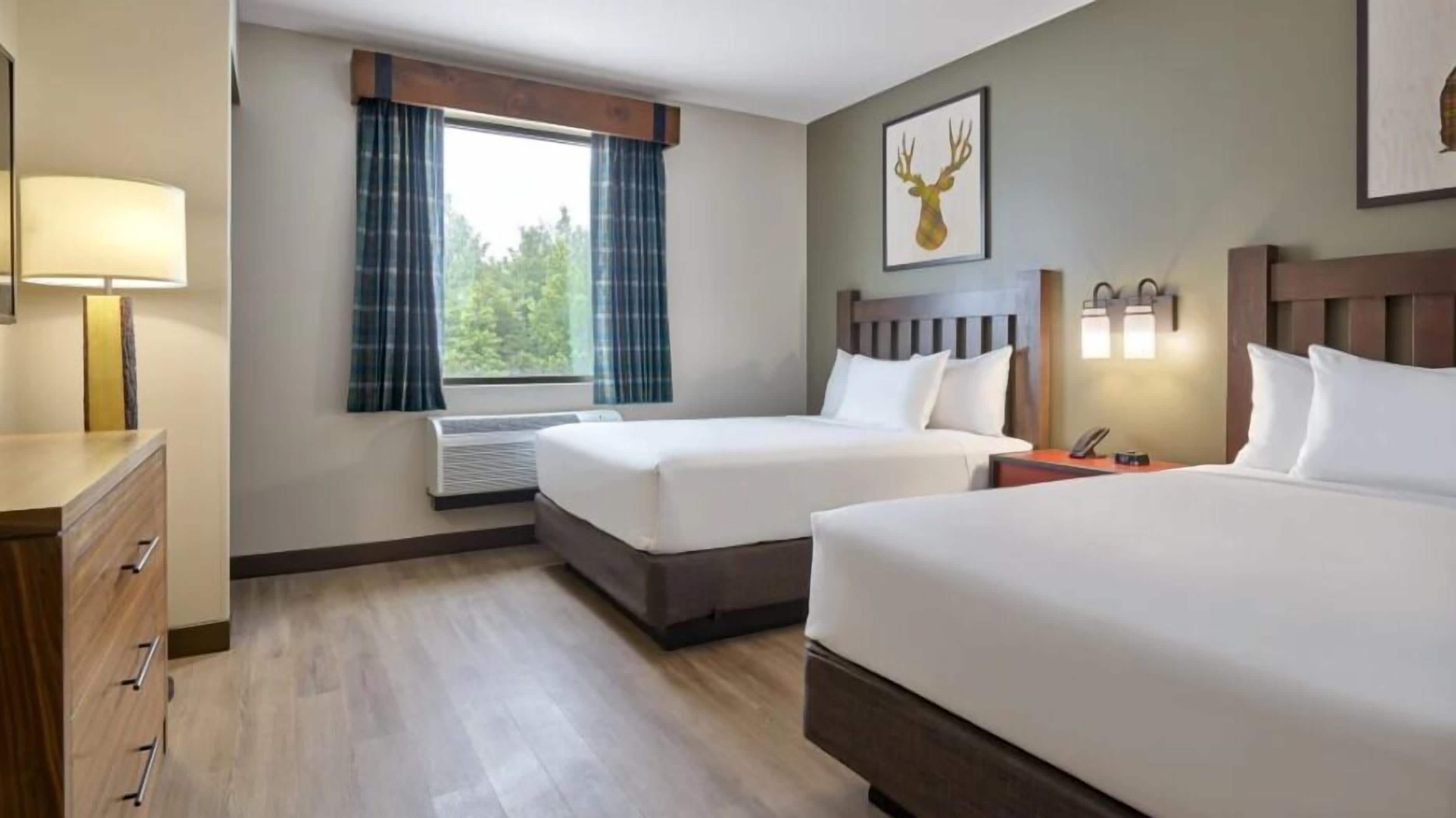 In-room safe, iron/ironing board, bed sheets, alarm clocks