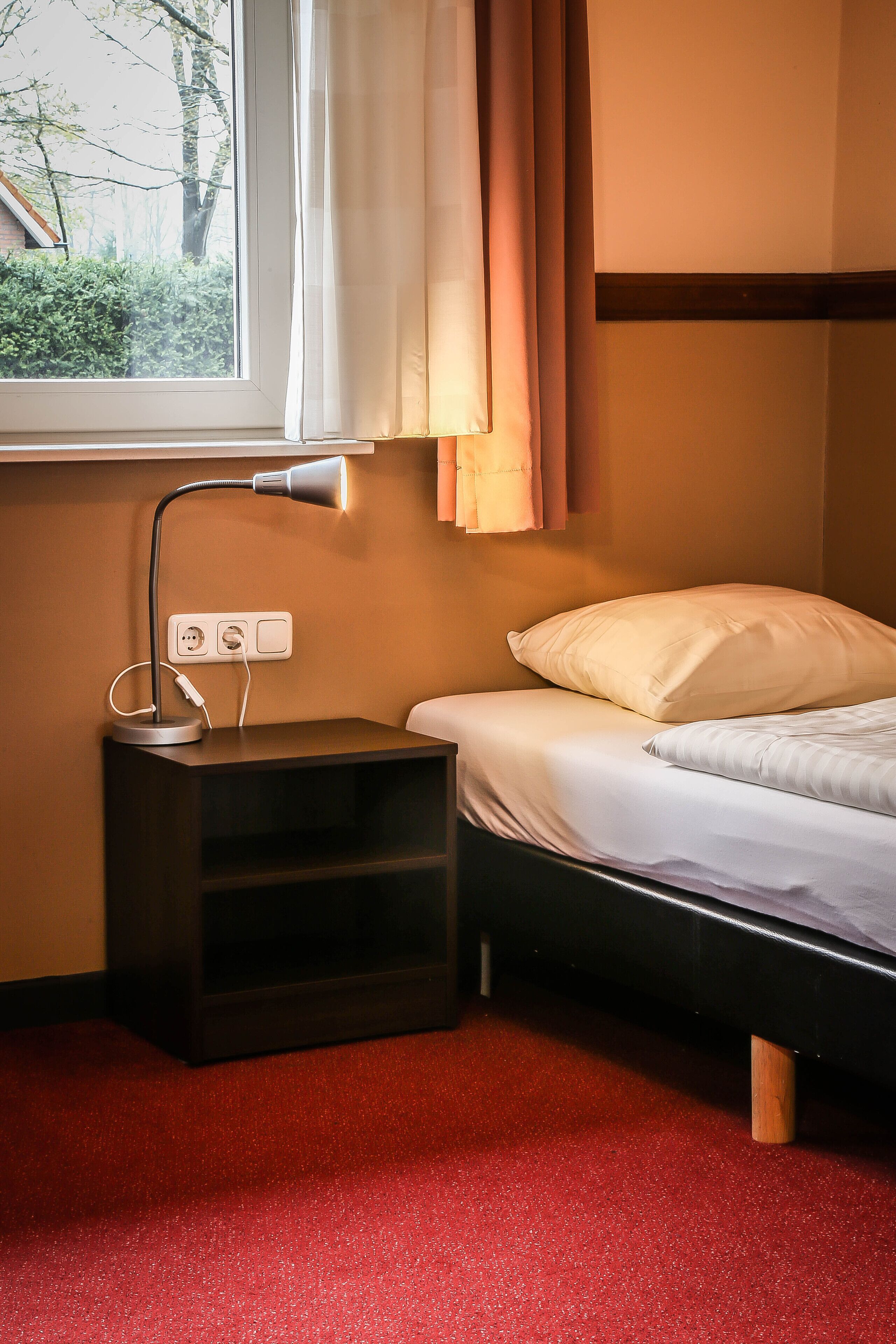 basic single room, shared bathroom | in-room safe, free wifi, bed sheets