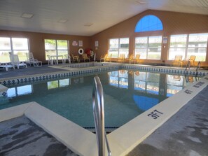 Seasonal outdoor pool, open 10:00 AM to 11:00 PM, pool umbrellas