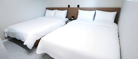 Kahden hengen deluxe-huone (kaksi sänkyä), tupakointi kielletty | Ylelliset vuodevaatteet, untuvapeitot, pimennysverhot, äänieristys