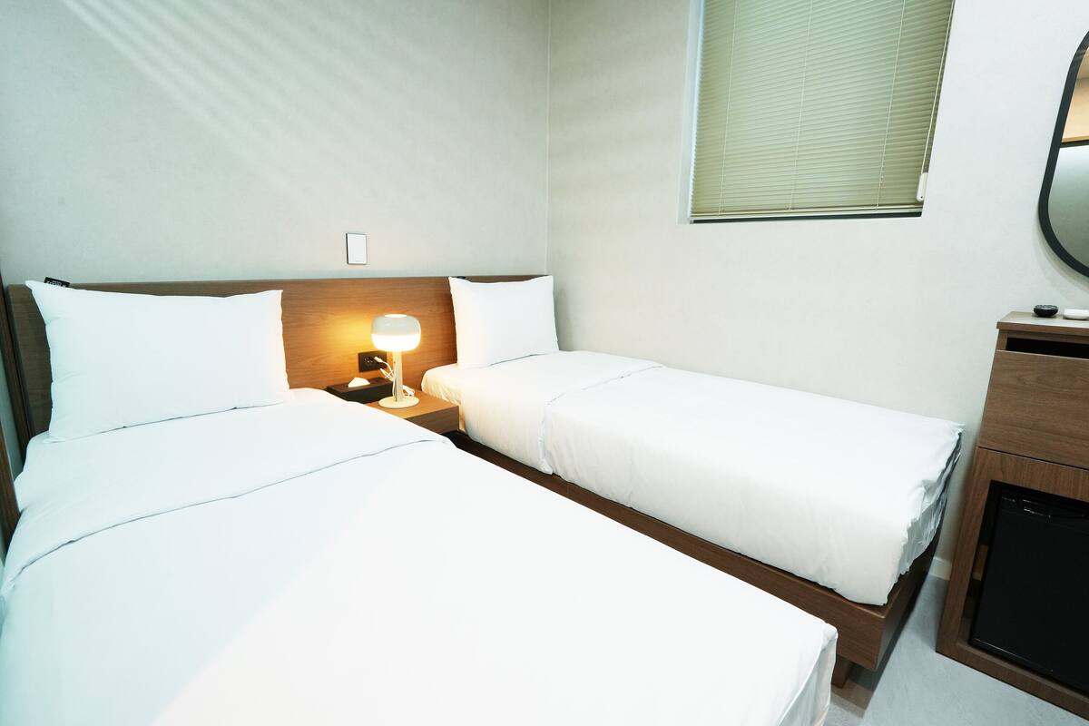 Premium bedding, down duvets, blackout curtains, soundproofing