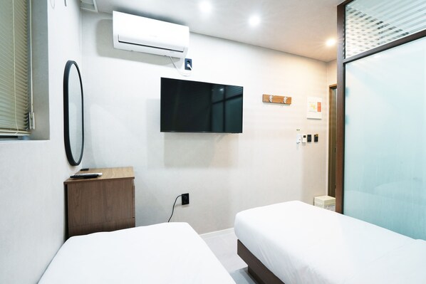 Premium bedding, down comforters, blackout drapes, soundproofing