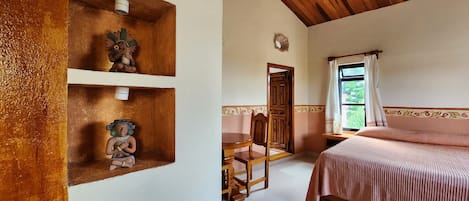 A room with a wooden bed, a chair, a wooden shelf with decorative items, and a window with curtains.