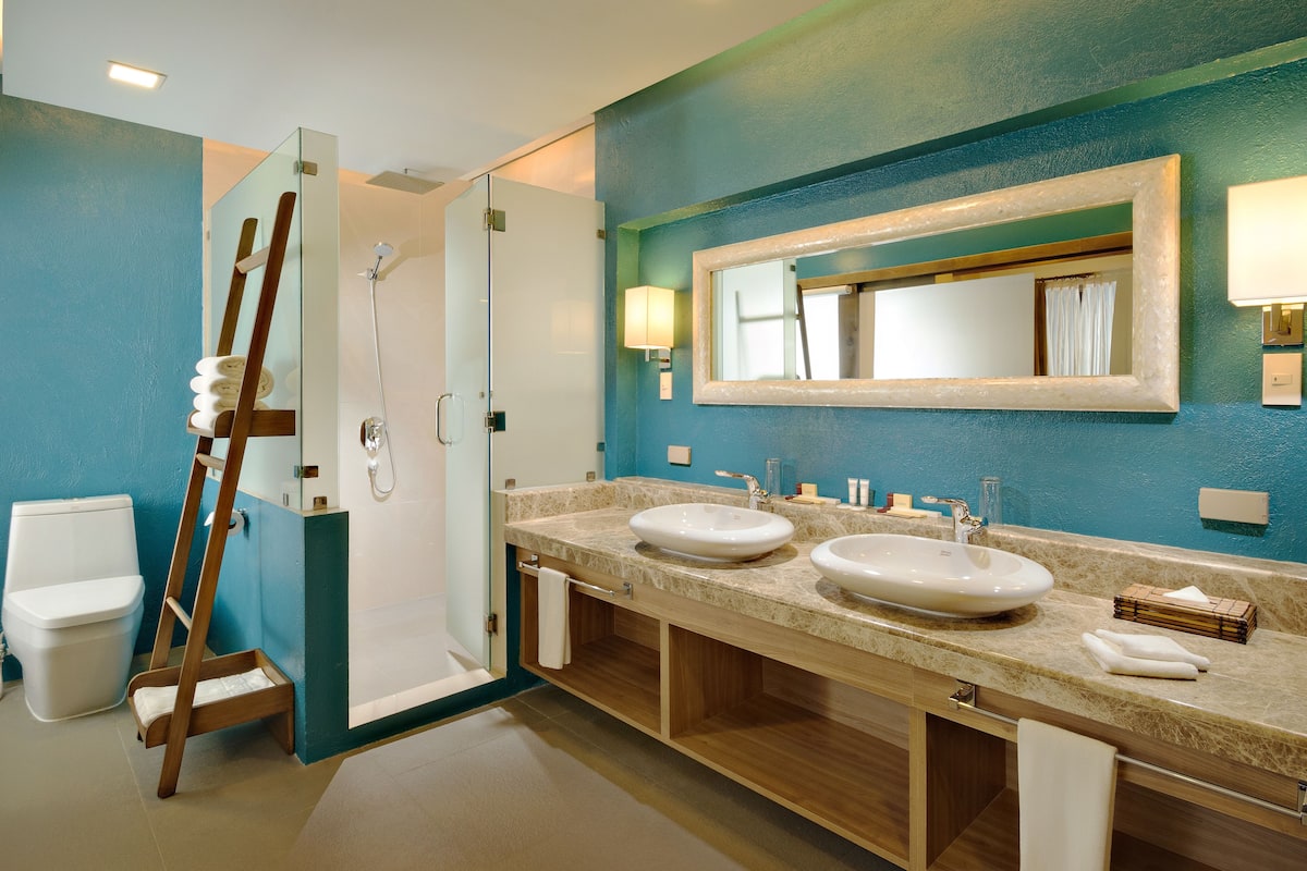 mithi deluxe villa | bathroom | shower, free toiletries, hair dryer, bathrobes