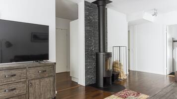 48-inch flat-screen TV with digital channels, TV, fireplace